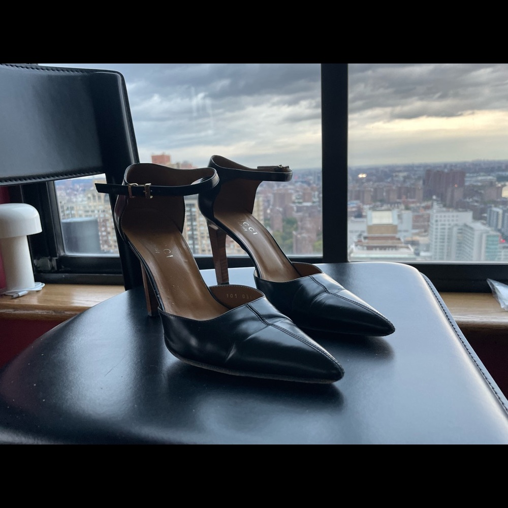 Black Gucci high heels with wooden heel.